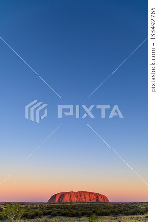 A stunning sunset view of Ayers Rock A stunning sunset view of Ayers Rock 133492765