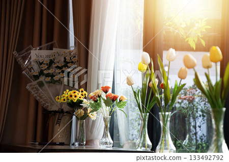 A relaxing corner by the window with soft red light A relaxing corner by the window with soft red light 133492792
