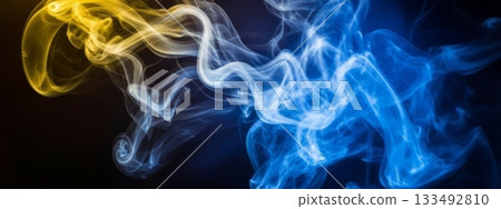 Dynamic Swirling Smoke with Vibrant Blue and Golden Hues Dynamic Swirling Smoke with Vibrant Blue and Golden Hues 133492810