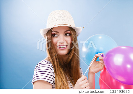 Woman summer joyful girl with colorful balloons Woman summer joyful girl with colorful balloons 133493625