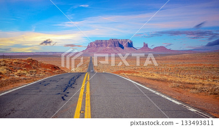 Monument Valley highway perspective with car 133493811