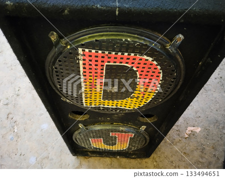 double speaker boxes on ground. Big bass speakers in a pro audio speaker cabinet. 133494651