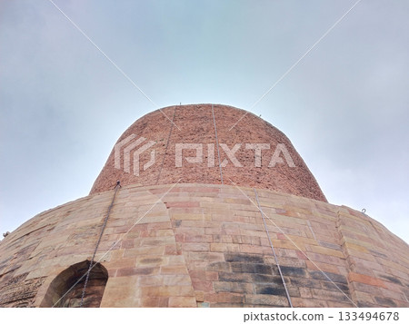 Dhamekh Stupa at Sarnath, Varanasi, India. stupa made by Indian ancient king Ashoka Dhamekh Stupa at Sarnath, Varanasi, India. stupa made by Indian ancient king Ashoka 133494678