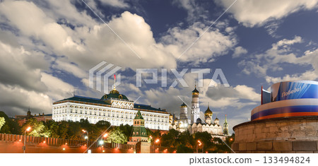 Moscow Kremlin (with decorations for the holiday of May 9 in honor of Victory Day celebration (WWII). Against the sky with clouds, Russia. TRANSLATION: Victory! 133494824
