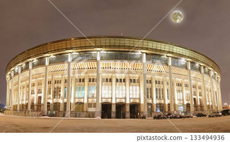 Night panorama of the Grand Sports Arena Luzhniki Olympic Complex in the winter, with the super moon, Moscow, Russia 133494936
