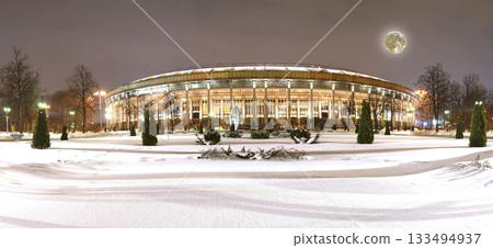 Night panorama of the Grand Sports Arena Luzhniki Olympic Complex in the winter, with the super moon, Moscow, Russia 133494937