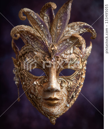 Realistic close-up of an elegant, ornate Venetian Carnival mask in deep purple, gold, and white, on silk 133495055
