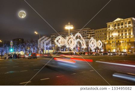New Year (Christmas) lighting decoration of the city (at night with the super moon), Tverskaya Street, Moscow. Russia New Year (Christmas) lighting decoration of the city (at night with the super moon), Tverskaya Street, Moscow. Russia 133495082