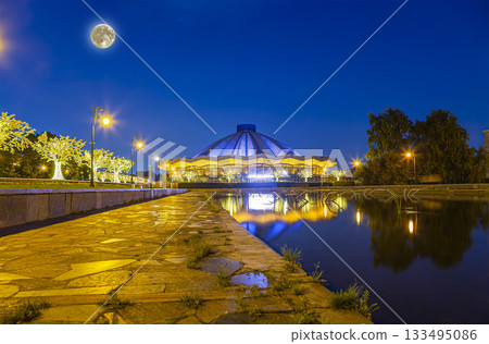 View over the Moscow State Circus  on Vernadskogo Prospekt, at night with the super moon, Russia 133495086