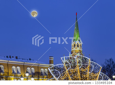 Christmas and New Year holidays illumination, at night with the super moont, Kremlin in Moscow, Russia. Christmas and New Year holidays illumination, at night with the super moont, Kremlin in Moscow, Russia. 133495104