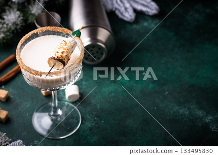 Christmas cocktail with toasted marshmellow Christmas cocktail with toasted marshmellow 133495830