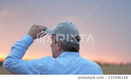 agriculture, wheat field, golden wheat farm field sunset, close up face male farmer wearing cap sunset, farmer walking through wheat field adjusting cap, mosquitoes flying near farmer face, man nature agriculture, wheat field, golden wheat farm field sunset, close up face male farmer wearing cap sunset, farmer walking through wheat field adjusting cap, mosquitoes flying near farmer face, man nature 133496188