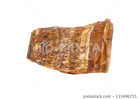 Raw Tiger's Eye Stone on Isolated Background 133496725
