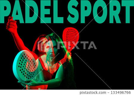Dynamic player showcasing skills in padel sport during an evening match indoors 133496766