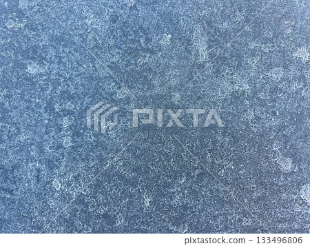 Frost pattern on the surface is a beautiful abstract background 133496806
