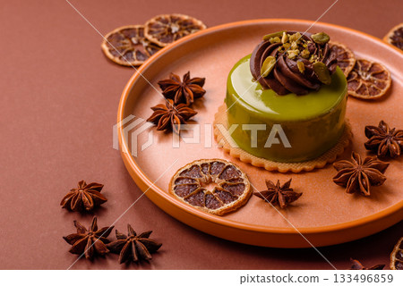 Pistachio cake or tart topped with green mousse with nuts and fruit filling. Pistachio pie Pistachio cake or tart topped with green mousse with nuts and fruit filling. Pistachio pie 133496859