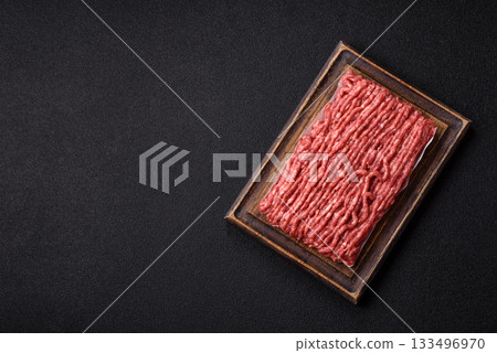 Raw ground beef or pork, fresh meat for burgers or other dishes. Raw beef minced meat 133496970