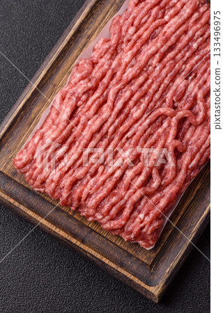 Raw ground beef or pork, fresh meat for burgers or other dishes. Raw beef minced meat 133496975