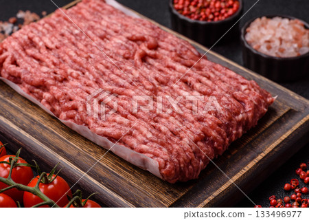 Raw ground beef or pork, fresh meat for burgers or other dishes. Raw beef minced meat 133496977