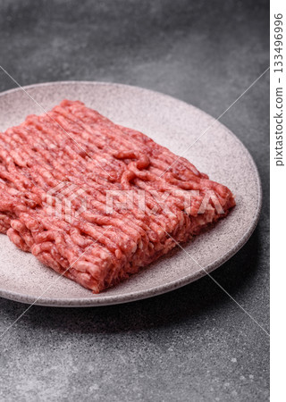 Raw ground beef or pork, fresh meat for burgers or other dishes. Raw beef minced meat Raw ground beef or pork, fresh meat for burgers or other dishes. Raw beef minced meat 133496996