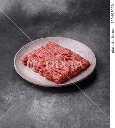 Raw ground beef or pork, fresh meat for burgers or other dishes. Raw beef minced meat Raw ground beef or pork, fresh meat for burgers or other dishes. Raw beef minced meat 133497000