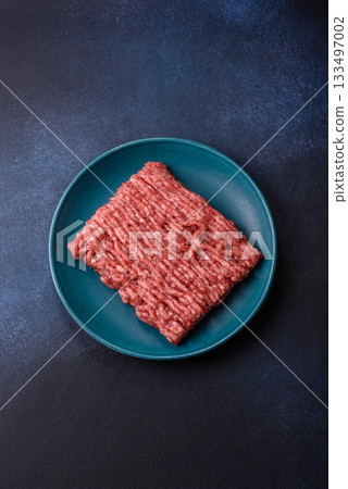 Raw ground beef or pork, fresh meat for burgers or other dishes. Raw beef minced meat 133497002