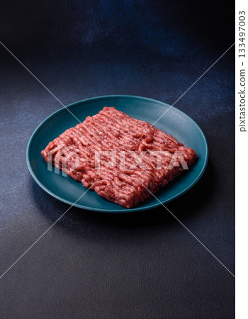 Raw ground beef or pork, fresh meat for burgers or other dishes. Raw beef minced meat 133497003
