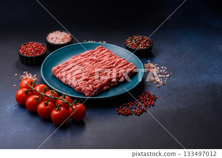 Raw ground beef or pork, fresh meat for burgers or other dishes. Raw beef minced meat Raw ground beef or pork, fresh meat for burgers or other dishes. Raw beef minced meat 133497012