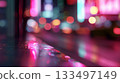 Colorful reflections and blurred lights create a vibrant street scene at night 133497149