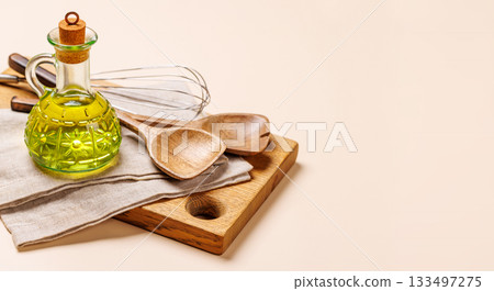 Kitchen utensils and spices on table Kitchen utensils and spices on table 133497275