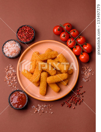 Mozzarella cheese sticks, crispy nutritious fast food. Cheese sticks as food background Mozzarella cheese sticks, crispy nutritious fast food. Cheese sticks as food background 133497379