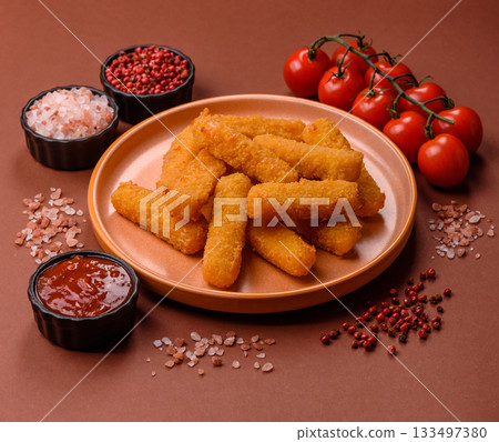 Mozzarella cheese sticks, crispy nutritious fast food. Cheese sticks as food background 133497380