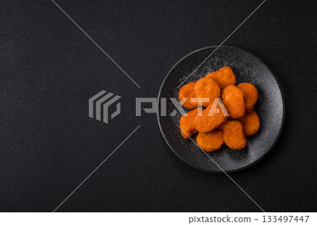 Chicken nugget with sauce, crispy nutritious fast food. Chicken nugget Chicken nugget with sauce, crispy nutritious fast food. Chicken nugget 133497447