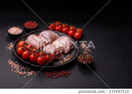 Chicken or turkey raw thigh fillet, skinless and boneless poultry meat. Chicken thigh fillet 133497518