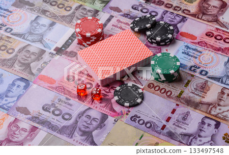 Casino and gambling in Thailand, risk to win or lose money. Betting chips as a background 133497548