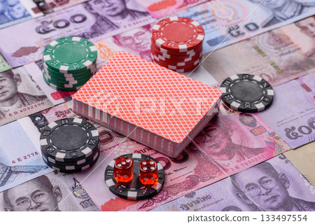 Casino and gambling in Thailand, risk to win or lose money. Betting chips as a background Casino and gambling in Thailand, risk to win or lose money. Betting chips as a background 133497554