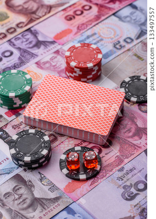 Casino and gambling in Thailand, risk to win or lose money. Betting chips as a background Casino and gambling in Thailand, risk to win or lose money. Betting chips as a background 133497557