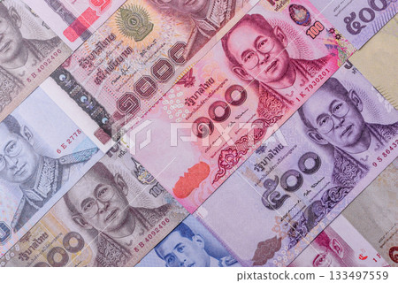 Thailand paper money, dinar banknotes as currency for exchange or travel. Thai money Thailand paper money, dinar banknotes as currency for exchange or travel. Thai money 133497559
