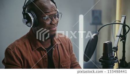 Voice Actor Recording Professional Voiceover For Film Voice Actor Recording Professional Voiceover For Film 133498441