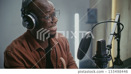 Voice Actor Recording Professional Voiceover For Film 133498446