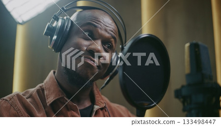 Voice Actor Recording Emotional Dubbing Lines In Studio Voice Actor Recording Emotional Dubbing Lines In Studio 133498447