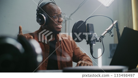 Voice Actor Records Professional Dubbing For Film or Media Project Voice Actor Records Professional Dubbing For Film or Media Project 133498497