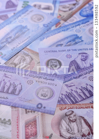 UAE money, dirhams, cash arabic banknotes for financial and business processes. Emirates cash UAE money, dirhams, cash arabic banknotes for financial and business processes. Emirates cash 133498592