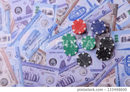 Casino game in the United Arab Emirates, dirham, chips, cards. Gambling in casinos in the Emirates 133498600