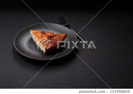 Cake, cheesecake sweet dessert, slice of delicious sweetness on a plate. Piece of cheesecake Cake, cheesecake sweet dessert, slice of delicious sweetness on a plate. Piece of cheesecake 133498669