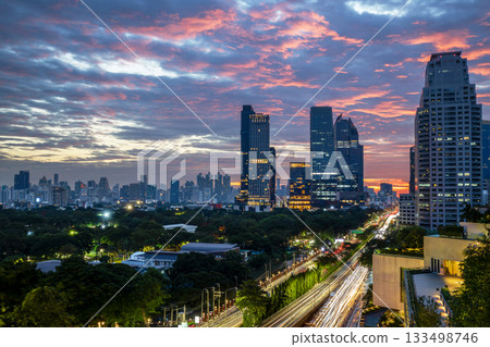 Bangkok business district with the public park area at sunrise. 133498746