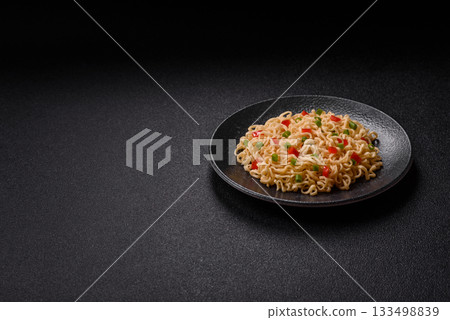 Asian food, chinese or thai rice noodles with vegetables and meat. Rice noodles Asian food, chinese or thai rice noodles with vegetables and meat. Rice noodles 133498839