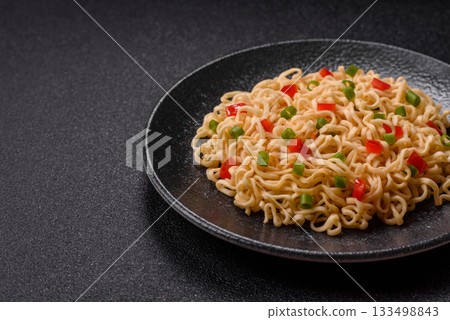 Asian food, chinese or thai rice noodles with vegetables and meat. Rice noodles Asian food, chinese or thai rice noodles with vegetables and meat. Rice noodles 133498843