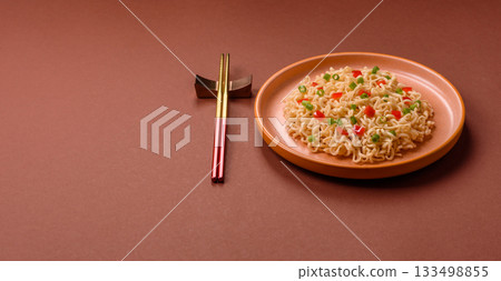 Asian food, chinese or thai rice noodles with vegetables and meat. Rice noodles Asian food, chinese or thai rice noodles with vegetables and meat. Rice noodles 133498855