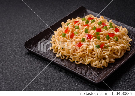 Asian food, chinese or thai rice noodles with vegetables and meat. Rice noodles Asian food, chinese or thai rice noodles with vegetables and meat. Rice noodles 133498886